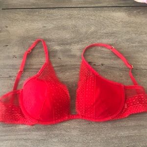 Sexy red lace bra from victorious secret. Gently used and in great condition.